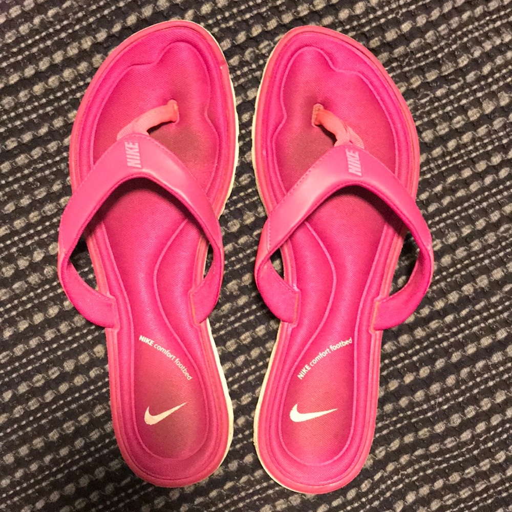 Hot pink Nike flip flops size 9